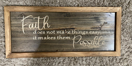 hanging faith quote sign that reads faith does not make things easy, it makes them possible