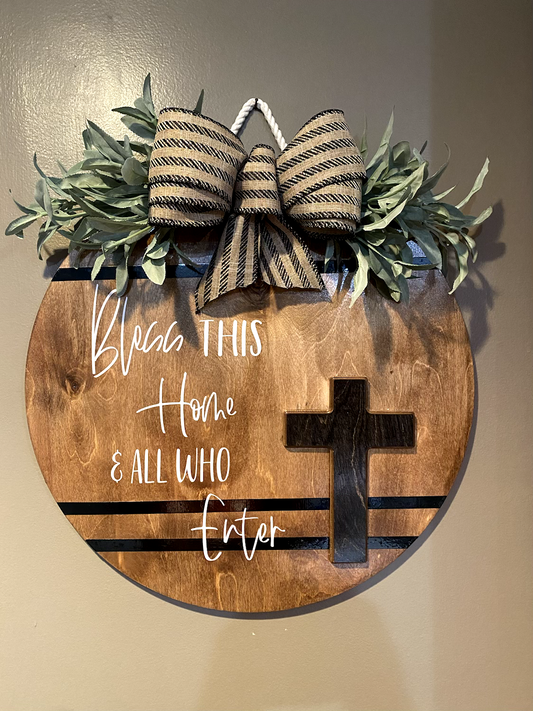 Bless This Home and All Who Enter handmade wooden door hanger with cross cutout and bow