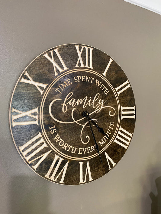 engraved wooden clock with roman numerals