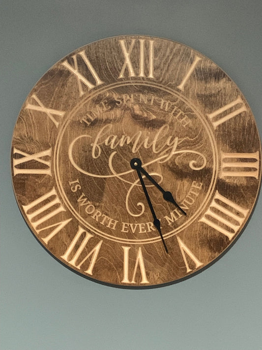 engraved wooden clock with roman numerals